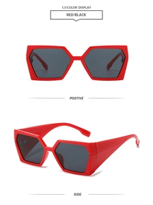 Detail view of red hexagonal sunglasses with black lenses from front and side angles