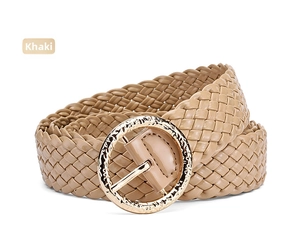 Close-up of khaki woven PU leather belt with a textured golden round metal buckle
