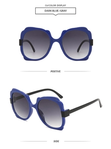 Multi-angle views of oversized butterfly sunglasses in dark blue with gray gradient lenses