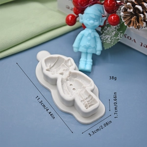 Detail view of elf-shaped silicone mold with product dimensions and a blue finished piece