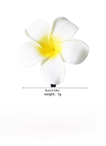 Macro detail of 9cm realistic plumeria hair clip showing soft white to yellow gradient petals
