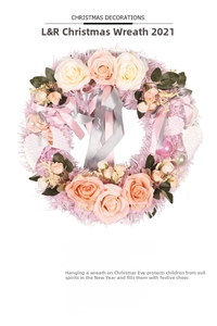Detailed view of pink rose wreath with angel wings and champagne decorative baubles