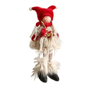 Christmas gnome doll in red knit hat and plush beard for holiday window decoration
