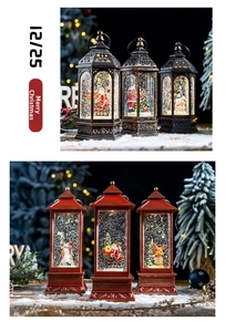 Detail of vintage Christmas snow globe lanterns with Santa and snowman scenes inside