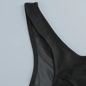 Detailed close-up of fine black mesh fabric and high-quality stitching on straps