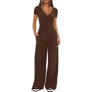 Close-up of deep brown V-neck pleated short sleeve top and wide-leg trousers set