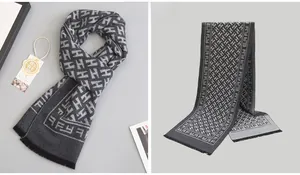 Detail view of premium grey wool scarf with H-letter pattern and tassel edges