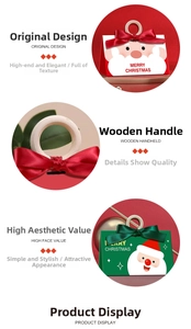 Detail view of festive Christmas gift boxes with wooden ring handles and Santa graphics