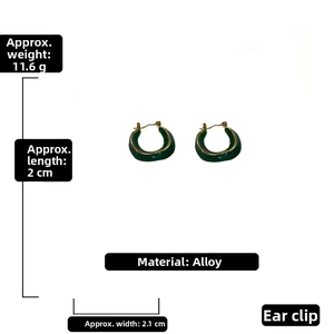 Detail view of green enamel C-shaped hoop earrings with size and weight specifications