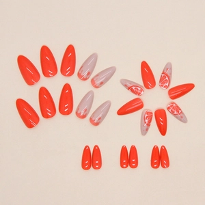Faux ongles amande brillants avec couleur orange vif et motifs de tranches d'orange