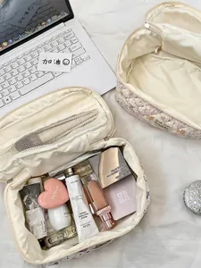 Floral quilted cosmetic bag set with large capacity and mesh compartments for travel storage