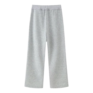 Detailed view of grey cotton knitted wide-leg pants with an elastic waist design