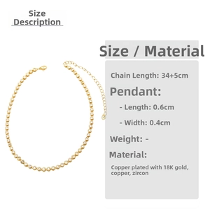 Detail of 18K gold plated copper necklace with zircon pendant measuring 0.6x0.4 cm