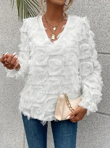 Detail of white V-neck blouse with fringe feather texture and ruffle sleeves for women