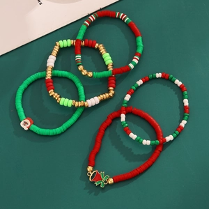 5-piece set of Christmas stretch bracelets with red, green beads and Santa charms