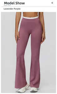 Détail du pantalon de yoga évasé violet à taille haute avec empiècement blanc à la taille