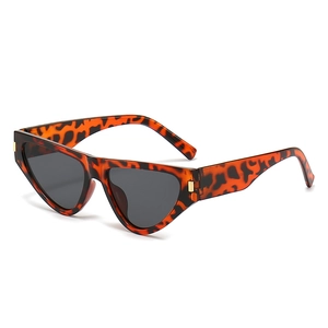 Retro cat-eye sunglasses with leopard print frames and dark gray lenses for women