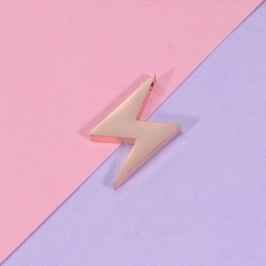 Polished rose gold lightning bolt pendant charm made of high quality stainless steel