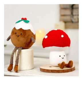Plush Christmas pudding and mushroom dolls on wooden stand for festive decor