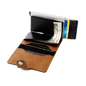 Brown leather RFID blocking wallet with silver aluminum pop-up card holder and secure snap