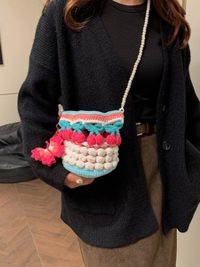 Handmade crochet bucket bag with cherry charms and pearl strap in pink and blue knit