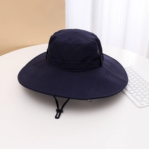 Detail of navy sun hat with wide brim, adjustable chin strap and side air vents