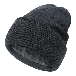 Close-up of winter knit beanie with thick fleece lining for warmth in dark grey color