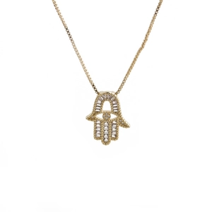 Detail of gold Hamsa hand pendant necklace with sparkling cubic zirconia and box chain