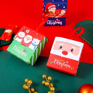 Festive Christmas candy gift boxes with red ribbons and Santa illustrations