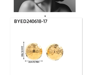 Detail of 18K gold hammer-textured geometric stud earrings showing size and fit