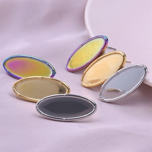 Macro view of oval 304 stainless steel earring bases in six metallic colors