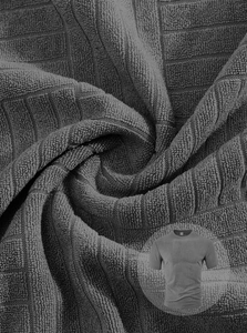 Detailed macro view of dark grey waffle knit fabric texture on men's casual short sleeve t-shirt