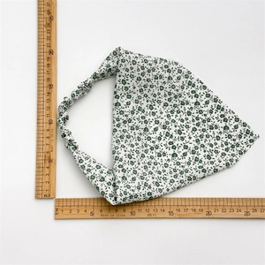 Detailed view of floral chiffon headscarf with measuring rulers showing product dimensions