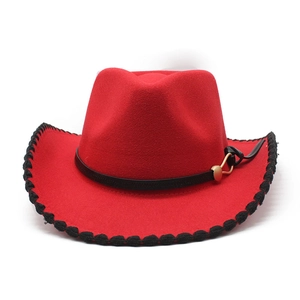 Detail of red wool felt cowboy hat featuring black woven trim and gold buckle belt