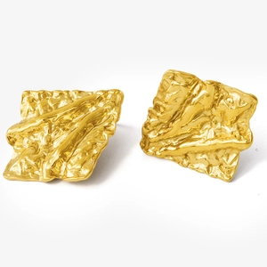 Macro view of 18k gold plated 304 stainless steel earrings with irregular fold texture