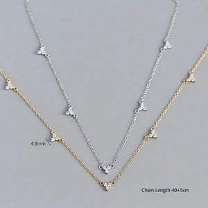 Collier en argent S925 avec pendentif trèfle en zircone, finitions or et argent
