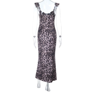 Detail of leopard print maxi dress featuring backless design and ruffled shoulder straps