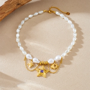 Elegant S925 gold pearl necklace with star and sun pendants featuring purple gemstone