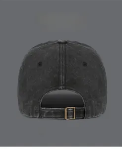 Detail of adjustable vintage metal buckle on washed cotton baseball cap with color options