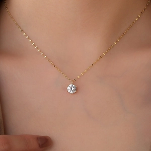 Elegant S925 sterling silver gold necklace with a sparkling round solitaire pendant