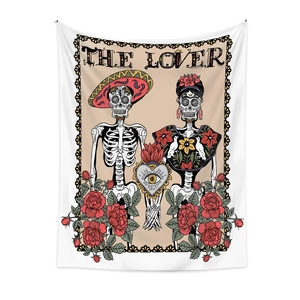 Detail of The Lover tarot tapestry with Calavera skeletons and red roses embroidery