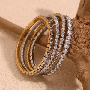 5-piece stackable 18K gold and silver plated stretch bracelets with sparkling cubic zirconia