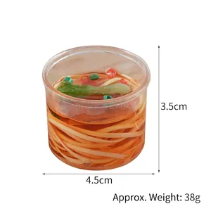 Miniature beef noodle keychain in clear barrel with detailed artificial food model