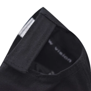 Detail of black cotton baseball cap with adjustable hook-and-loop strap and inner label