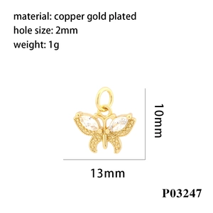 Macro detail of butterfly charm with zircon inlay and 18K gold plated copper dimensions