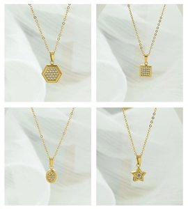 Macro detail of geometric cubic zirconia pendants in square star and oval shapes