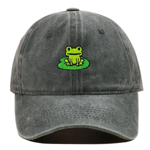 Close-up of green frog embroidery on lotus leaf on washed cotton dark grey baseball cap