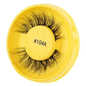Detail of glue-free black thick curly false eyelashes in a yellow case model #104A