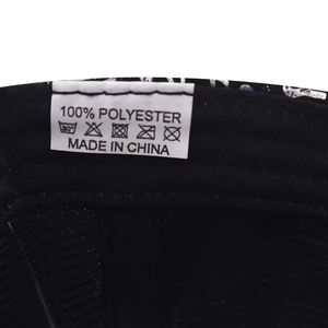 Detail view of the interior washing label showing 100% polyester and Made in China text