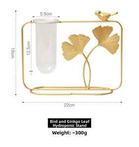 Detail view showing dimensions of golden ginkgo leaf iron hydroponic vase with bird